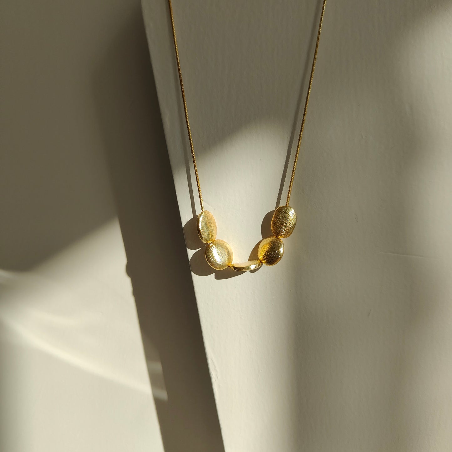 Raha Pendant 18kt