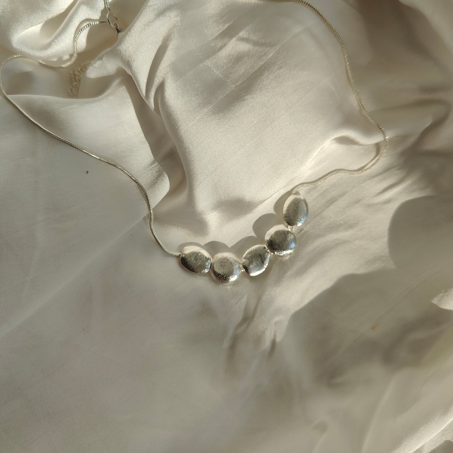 Raha Pendant 18kt