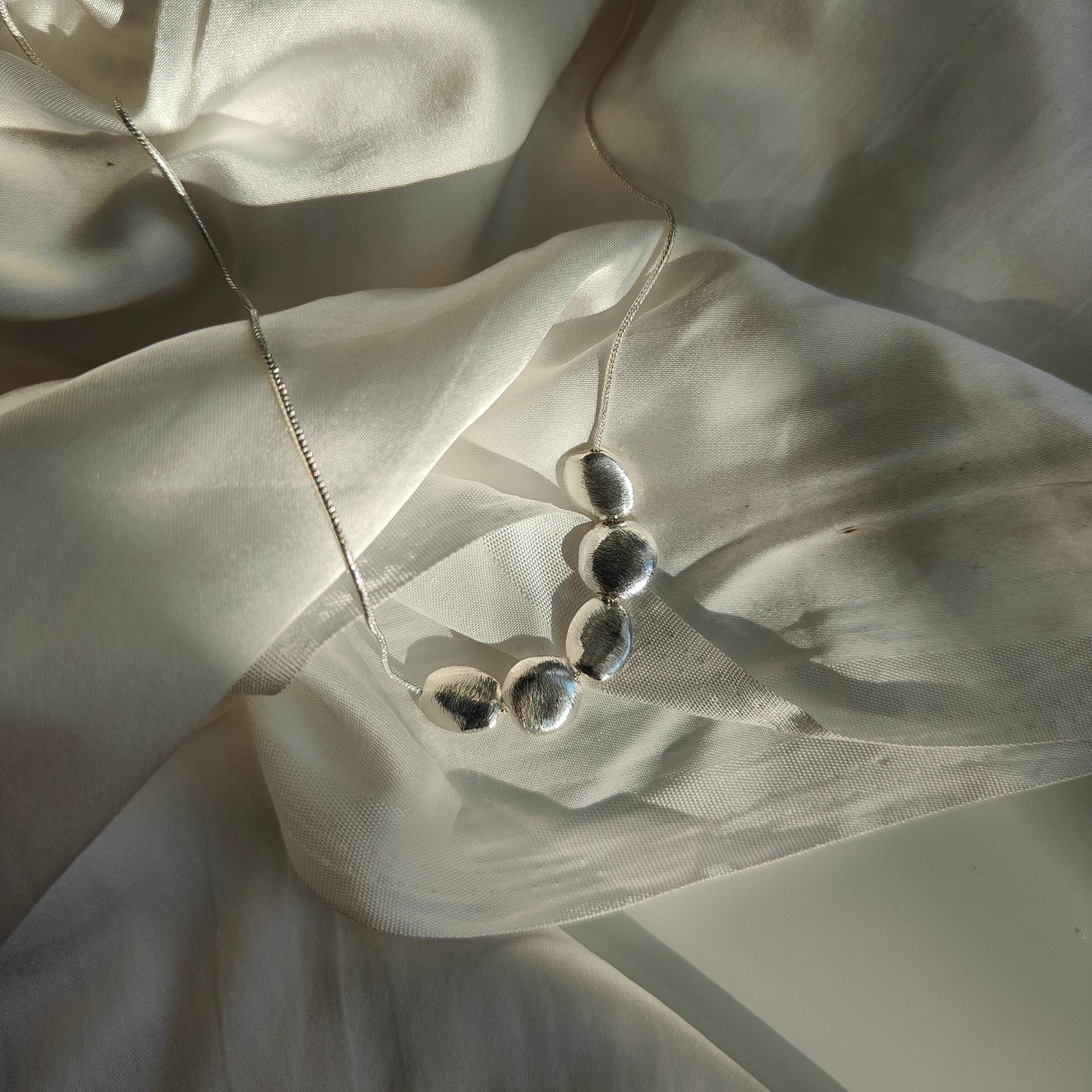 Raha Pendant 18kt