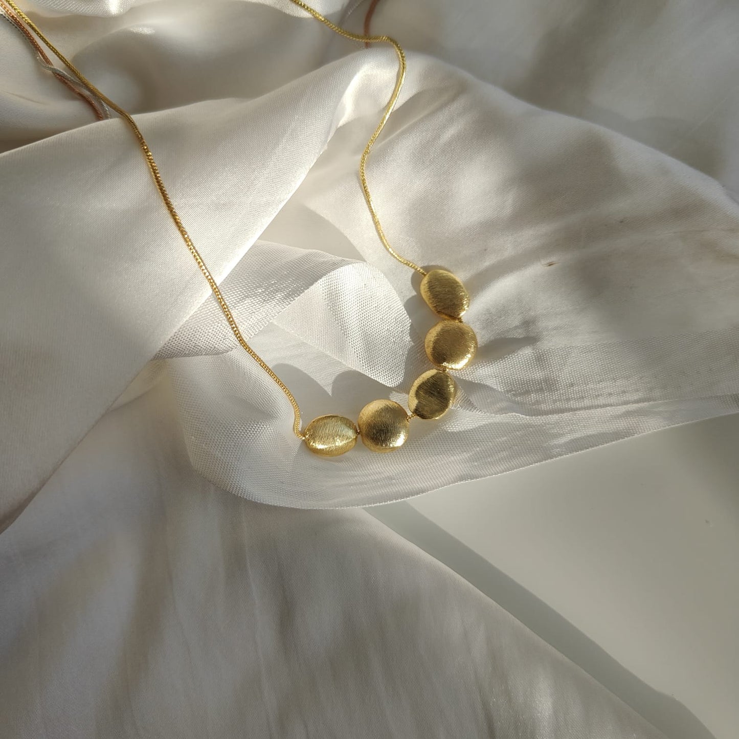 Raha Pendant 18kt