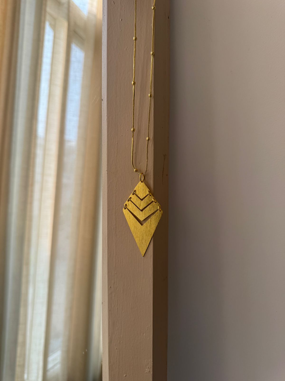 Tail Statement Neckpiece